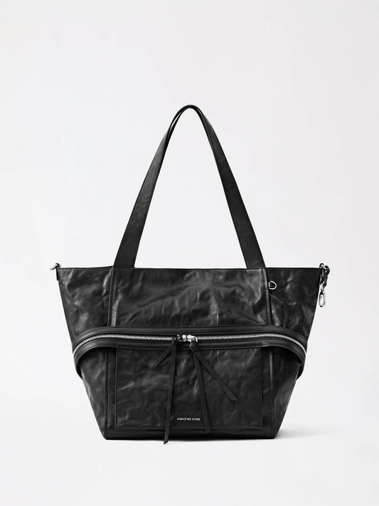 Cheese roll tote bag in genuine top-grain leather with a roomy bakery-inspired silhouette