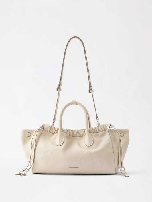 Cloud hobo bag large in soft slouchy top-grain leather held by its wide strap