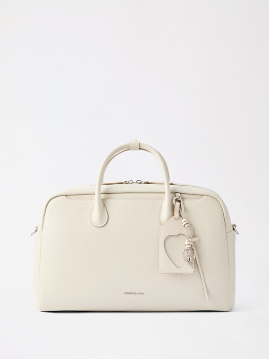 Large travel Boston bag in top-grain leather with structured handles and a roomy interior for trips