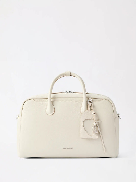 spacious top-grain cowhide leather Boston travel bag in warm tan, wide-open mouth facing up