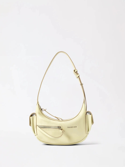 A small liqueur crescent leather bag in warm tan leather